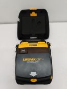 A pre-owned LifePak CR Plus defibrillator with expired battery (EXP: 2023-06-22).