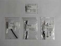 Four as new Orascoptic accessories: 1x Head Strap Kit (REF:921965-2), 1x Nose Pad Kit (REF: 922318-1