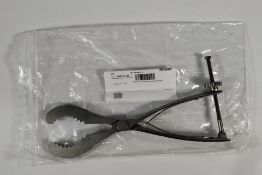 A Stryker/Howmedica Slotted Patella Resection (REF: 6633-7-736).