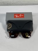 A pair of Ray-Bans Square sunglasses in brown with brown classic lenses (RB2148).