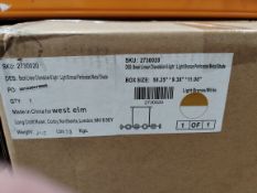 A West Elm Bezel 6-Light Linear Perforated Metal Chandelier, 131cm.