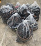 Nine bags of assorted pre-owned belts.