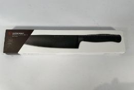An as new Wüsthof Performer Chef's Knife, 20cm (over 18s only).