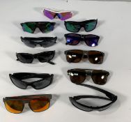 Eleven pairs of pre-owned Oakley sunglasses to include Radar, Gascan, Turbine.