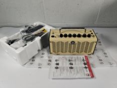 A Yamaha THR5 electric guitar home combo amp.