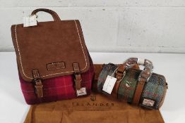 Two as new Islander Harris Tweed bags - one chestnut blue tartan handbag and a fuchsia tartan backpa