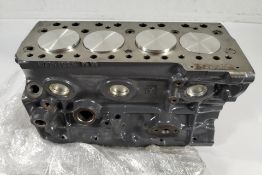 A preowned Classic Mini BMC 998 A+ engine block and pistons. (WFM1026NW)