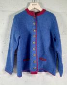 Its Alippa cardigan 100% Schurwolle (merino lambs wool), Size EU 42, blue with pink edging.