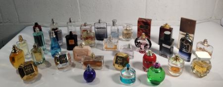 Approximately fifty assorted part used parfum/eau de toilette to include YSL, Versace, Givenchy.