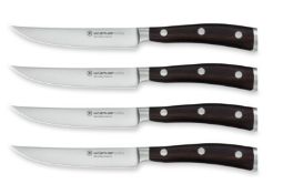 An as new Wusthof Ikon 4-piece steak knife set 4.1/2