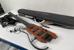 A pre-owned Donner Hush X electric guitar.