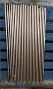 Twenty four stainless steel solid round rods - grade 310, approximately 100 x 2cm.
