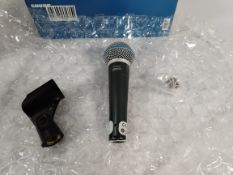 An as new Shure Beta 58A Supercardioid Dynamic Vocal Microphone.