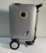 A pre-owned Airwheel Robot SE3S ride-on suitcase includes battery (no charger).