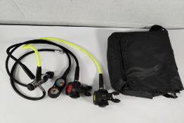 A pre-owned Seac Sub X5 regulator set with oceanic gauges in bag.