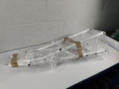An as new Triumph T2071754 - Rear Subframe Assy, white.