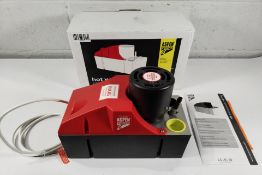 A boxed Aspen hot water Economy condensate tank pump - 900L/h max flow, 6m/20ft max head. Box opened