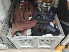 A stillage of assorted pre-owned clothing and related (stillage not included).