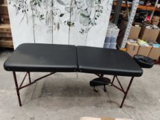 An as new Master Massage portable massage table.