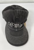 A pre-owned Off-White Off-White Logo Embroidered Baseball Cap.