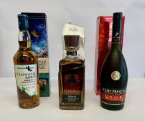 Talisker Skye single malt whisky 700ml, The Nikka Premium blended whisky 700ml and a Remy Martin cog
