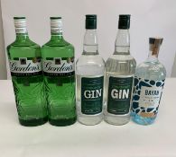 Two Gordon's London Dry Gin 2 x 1L, two By Amazon London Dry Gin 2 x 1L and one Bayab African Grown