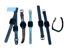 Assorted pre-owned smartwatches including two Apple Watches (iCloud locked, sold for parts only) (Al
