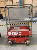 A pre-owned Pop-up Push Pro elevating work platform.
