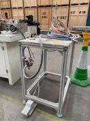 A pre-owned tilt head rod shaper, pneumatic on aluminium frame table.