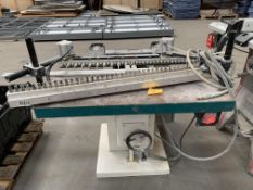 A pre-owned multi head drill table 240v.
