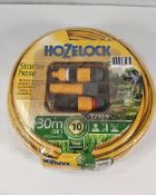 An as new Hozelock 30m starter hose set (72309).