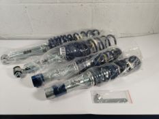 A Jom blue line suspension kit (2x 760131 and 2x 760130).