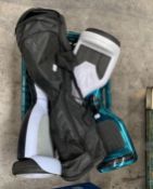 Four assorted pre-owned hover boards unboxed.