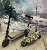 Two pre-owned eScooters, one with missing seat.