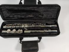 A pre-owned Cecilio CFE-28N closed hole flute.