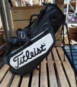 A pre-owned Titleist Tour Series Premium Stadry waterproof golf stand bag (broken zip on front small