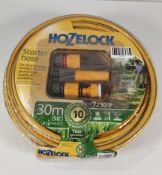 An as new Hozelock 30m starter hose set (72309).