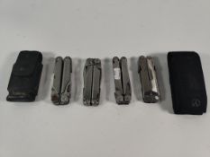Five pre-owned Leatherman multitools to include Wave and Rebar.