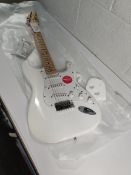 A boxed as new Squier Sonic Stratocaster, Arctic White.