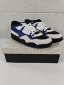 A pair of as new Nike Air Jordan 4RM Flight trainers UK9.