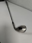 An as new Cleveland RTZ Tour Rack wedge, 58 Low 6, RH with Dynamic Gold shaft.