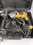 A pre-owned DeWalt D21570 GB 1300W Electric Silver Bullet Diamond Core Drill 230V.