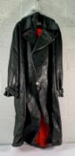 An Alexander McQueen leather trench coat with belt, comes with box and hanger.