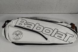 An as new Babolat 12 Racket Tennis Bag, Pure Wimbledon White/Grey/Danimal (RH12).