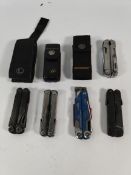 Five pre-owned Leatherman multitools to include Free and Rebar.