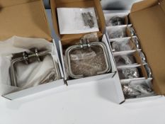 Assorted door hardware to include solid and tubular safety levers and peanut turn & release (30 sets