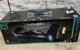 A Go Trax Glide self-balancing board boxed.