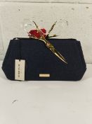 An as new with tags Alexis Bittar scissor clutch in dark denim.