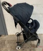 A pre-owned Gokke Stroller.