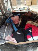 A pallet of assorted pre-owned clothing, shoes and clothing accessories.